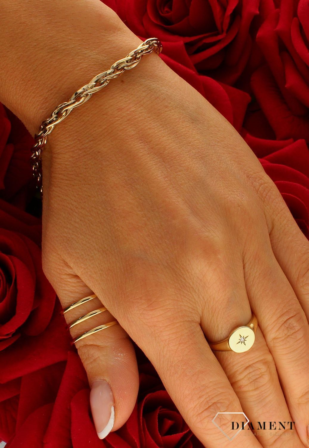 Złota bransoletka damska 375 skręcone lineczki BR 4224 375.jpg